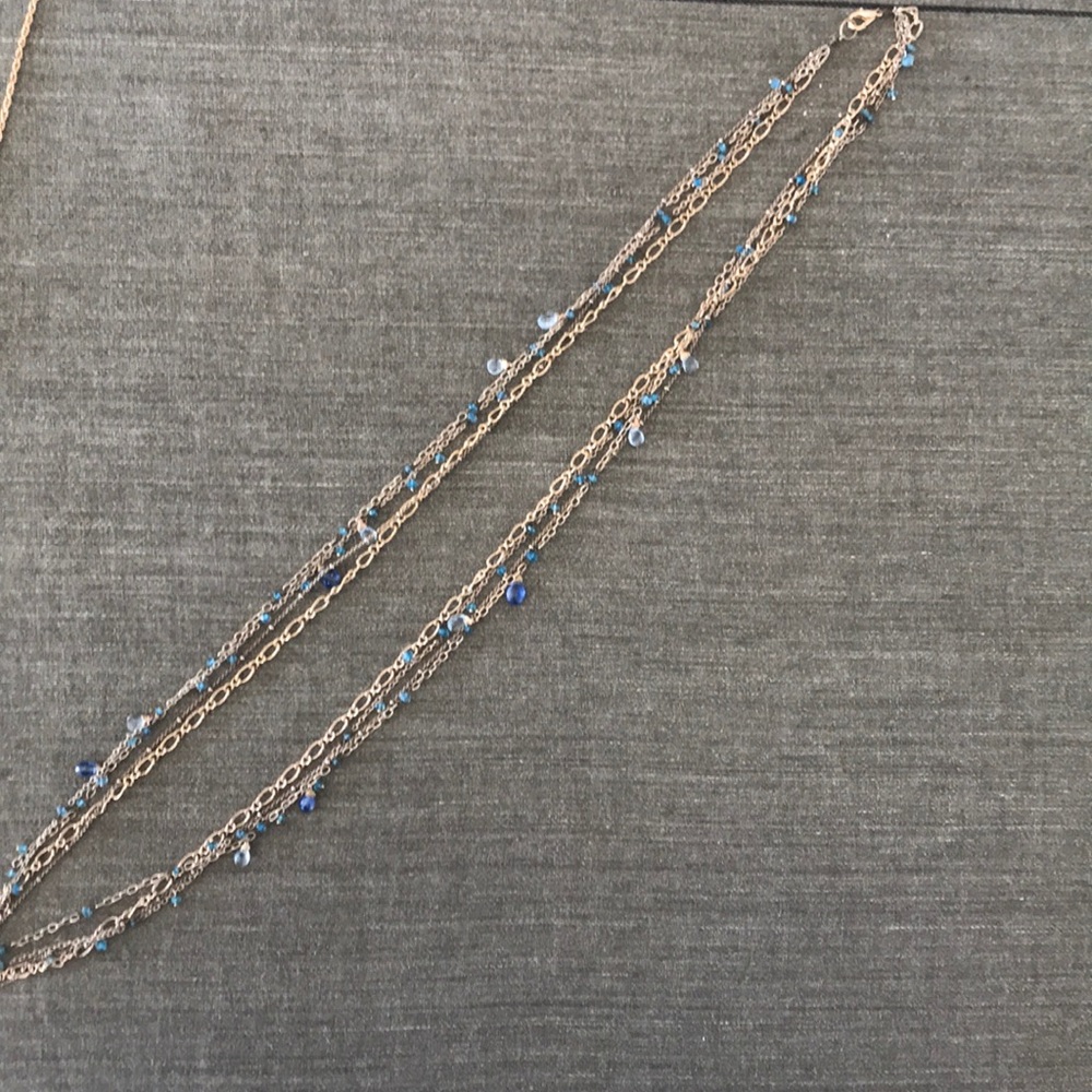 Alexis Bittar long strand gold and blue necklace